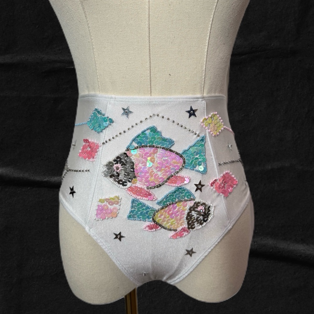 Her pony sequin fish hot pants